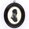 Front of Silhouette, in frame, with man looking right and wearing naval uniform